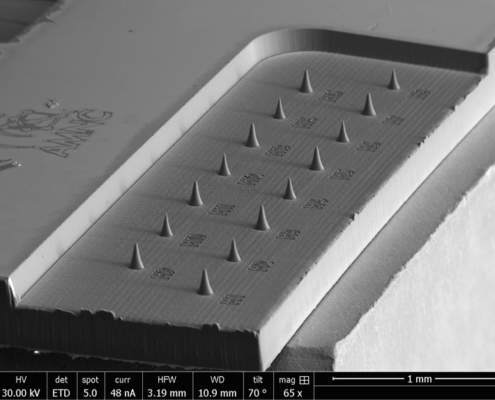 SEM image of processed Titanium Nitride on Silicon microtip arrays using the microPREP PRO FEMTO. Image courtesy of the University of Leoben.